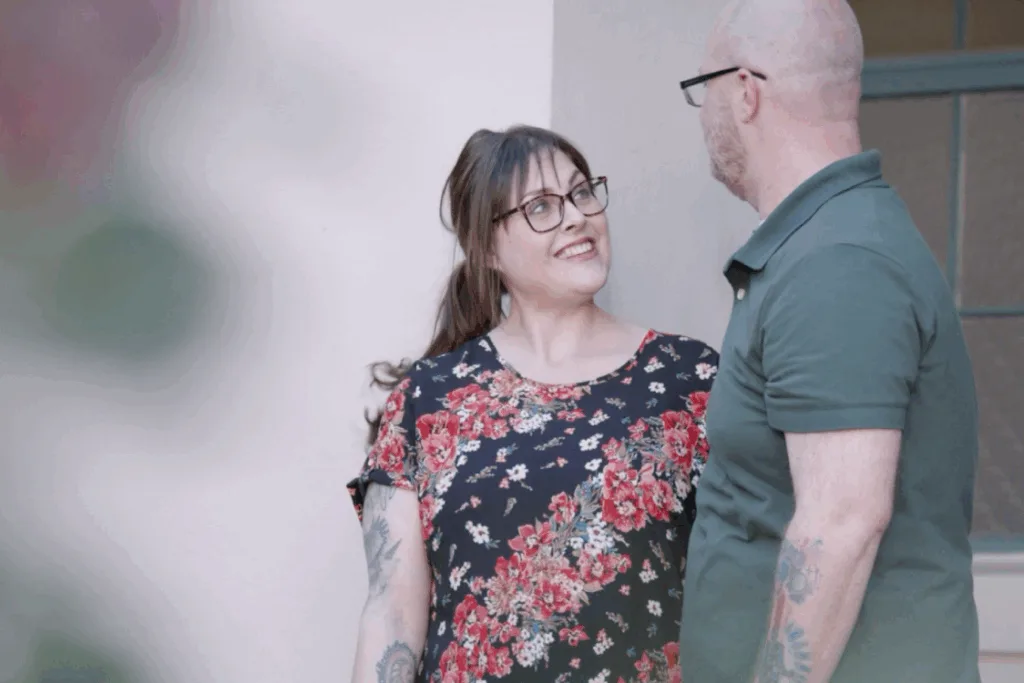 Husband and wife embracing