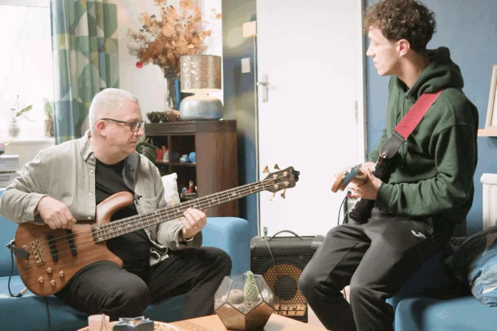 Husband and son playing music together