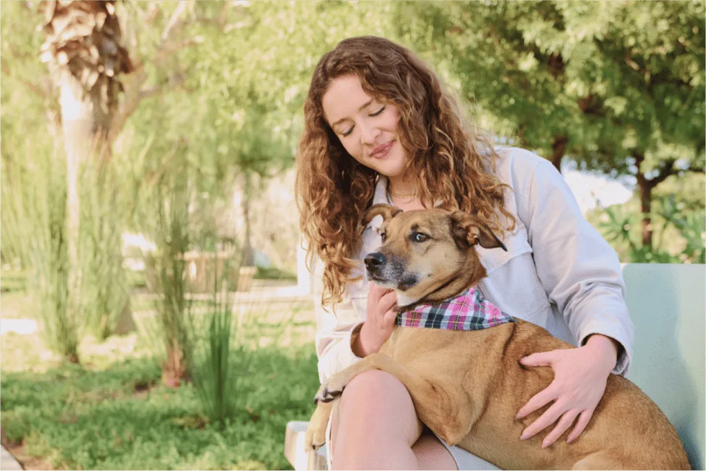 Woman petting a dog